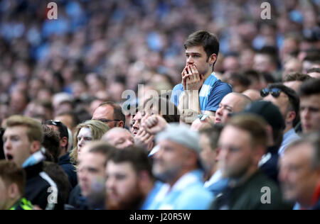 Manchester City fans show dejection after Arsenal equalise during the Emirates FA Cup, Semi Final match at Wembley Stadium, London. Stock Photo