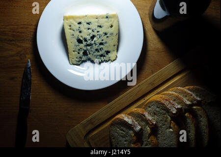 French cheese called Bleu des causses, bread and red wine Stock Photo