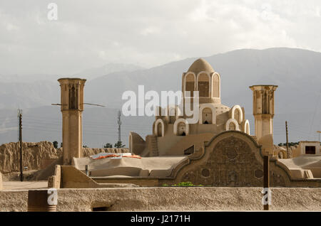 Wind catchers (traditional Persian architectural element to create natural ventilation in buildings) of Borujerdi historical house in Kashan, Iran. Stock Photo