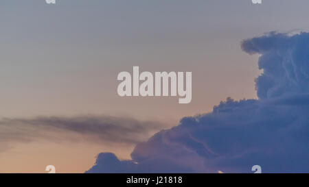 Colorful clouds at sunset Stock Photo