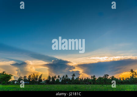 Colorful clouds at sunset Stock Photo