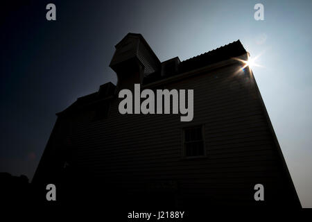 A silhouette view of the Tide Mill in Woodbridge, Suffolk Stock Photo