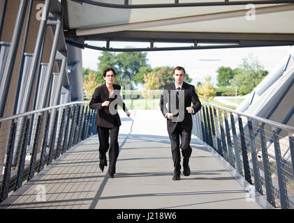 A shot of two business people running competing against each other Stock Photo