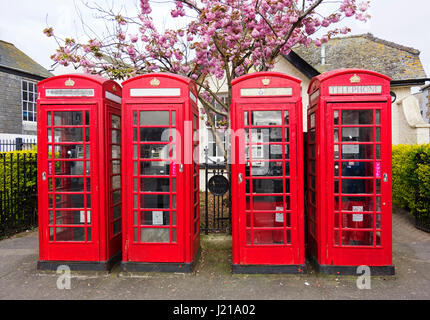 Four classic English Red Telephone Boxes Stock Photo