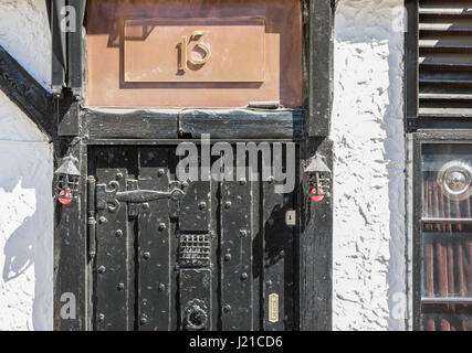 a very old exterior door on a building in London England, UK Stock Photo