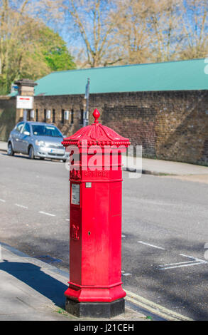An old red English letter box in London England, UK Stock Photo
