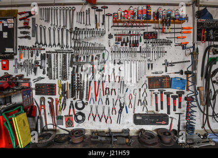 Tools neatly arranged on a wall in a car repair shop in Treplin, Germany, 21 April 2017. Photo: Patrick Pleul/dpa-Zentralbild/ZB Stock Photo