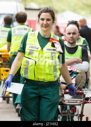 London, UK. 23rd Apr, 2017. Members of St John Ambulance helping runners. Runners finish the 37th London Marathon on the Mall. Credit: Bettina Strenske/Alamy Live News Stock Photo