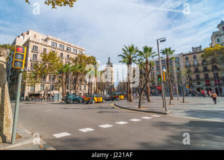 Barcelona, Spain, Nov 3rd, 2013:   Tourism in Europe.  Street level view of pleasant day in Barcelona sunny afternoon, people outdoors on warm day. Stock Photo