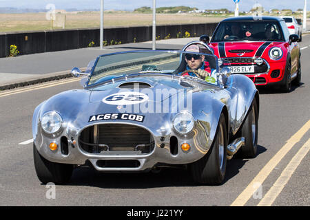 Kirkham 427-Sc at Vintage Festival and Classic Vehicle Show, with cars driving down the resort seafront and promenade, Southport, Merseyside, UK Stock Photo