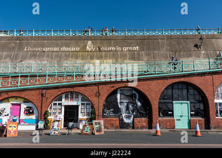 I have great desire. My desire is great -Inspirational quote on Brighton Seafront Wall Stock Photo