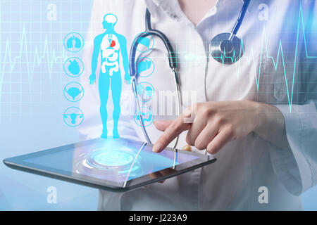 Doctor working on a virtual screen. medical concept Stock Photo