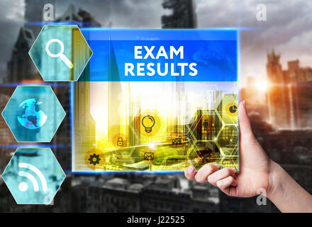 Technology, internet, business and marketing. Young business woman writing word: Exam results Stock Photo