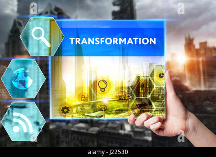 Technology, internet, business and marketing. Young business woman writing word: Transformation Stock Photo