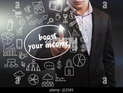 Business, Technology, Internet and network concept. Business man working on the tablet of the future, select on the virtual display: boost your income Stock Photo