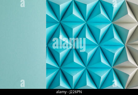 Abstract blue to grey paper poly  made from  tetrahedron background. Usefull for business cards and web. Stock Photo
