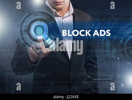 Business, Technology, Internet and network concept. Business man working on the tablet of the future, select on the virtual display: block ads Stock Photo
