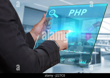 Business, Technology, Internet and network concept. Business man working on the tablet of the future, select on the virtual display: PHP Stock Photo