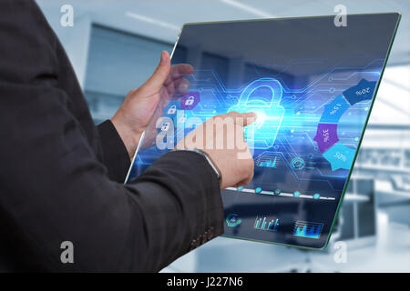 Business, Technology, Internet and network concept. Business man working on the tablet of the future, select on the virtual display: Login Stock Photo