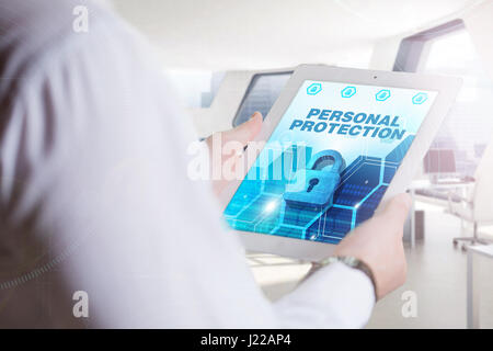 Business, Technology, Internet and network concept. Young business man, working on the tablet of the future, select on the virtual display: Personal P Stock Photo