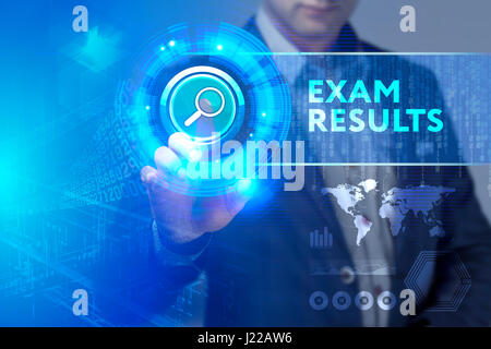 Business, Technology, Internet and network concept. Business man working on the tablet of the future, select on the virtual display: Exam results Stock Photo