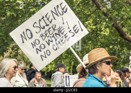 Woman holds sign during March for Science on earth day Stock Photo