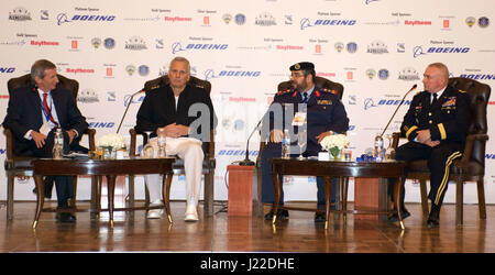 Howard Bromberg, Vice President and Deputy, Strategy and Business Development, Air and Missile Defense, Lockheed Martin, Vice Adm. James D. Syring, Director, Missile Defense Agency, Brig. Gen. Adel Al Hafez, Commander, Kuwait Air Defense Forces, and Maj. Gen. Blake C. Ortner, 29th Infantry Division Commanding General conclude a panel discussion at the Kuwait International Air Power and Defense Symposium March 27, 2017 at the Regency Hotel, Kuwait City, Kuwait. KIAPADS was held in commemoration of the Liberation of Kuwait. (Photo by U.S. Army Capt. Christy Hanson, 29th Infantry Division PAO) Stock Photo