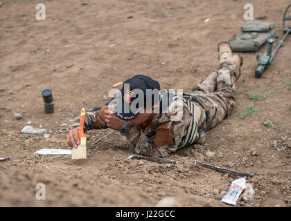 170415-N-NL576-010 Baghdad (April 15, 2017) - An Iraqi special operations forces soldier practices sweeping an area for improvised explosive devices during training conducted by Coalition members assigned to Combined Joint Special Operations Task Force - Iraq.  This training is part of the overall Combined Joint Task Force – Operation Inherent Resolve building partner capacity mission by training and improving the capability of partnered forces fighting ISIS.  CJTF–OIR is the global Coalition to defeat ISIS in Iraq and Syria.    (U.S. Navy Photo by Chief Petty Officer Brandon Raile) Stock Photo