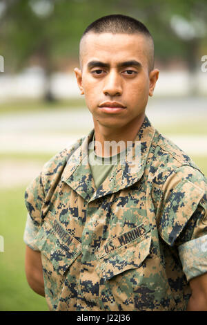 Pvt.  Triston N. Sonden, Platoon 3028, India Company, 3rd Recruit Training Battalion, earned U.S. citizenship April 20, 2017 , on Parris Island, S.C. Before earning citizenship, applicants must demonstrate knowledge of the English language and American government, show good moral character and take the Oath of Allegiance to the U.S. Constitution. Sonden, from Frederick, Md., originally from Federal State of Micronesia, is scheduled to graduate April 21, 2017 . (Photo by Cpl. Aaron Bolser) Stock Photo