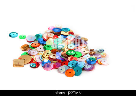 decorative craft sequins on a white background Stock Photo
