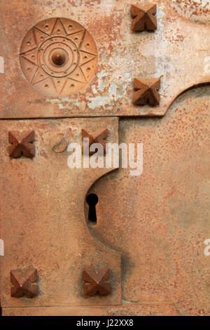 Detail of a medieval keyhole in Siena, Italy Stock Photo