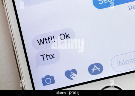 Text message on iPhone screen (LOL text message, common texting slang) -  USA Stock Photo - Alamy