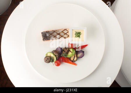 Salmon with grilled vegetables Stock Photo