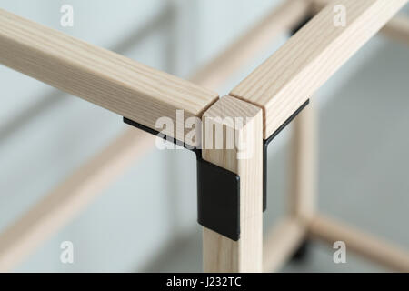 Wooden construct with metal parts Stock Photo