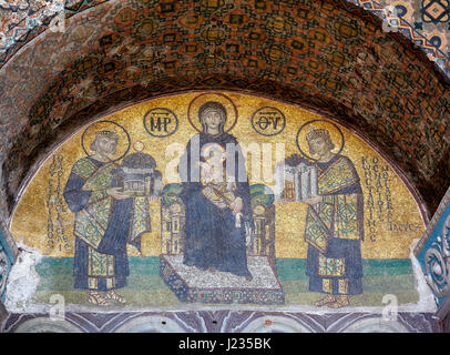 ISTANBUL, TURKEY - JULY 9, 2014: The mosaics in the interior of Hagia Sophia: Virgin with Child flanked by Justinian I and Constantine I, Istanbul, Tu Stock Photo