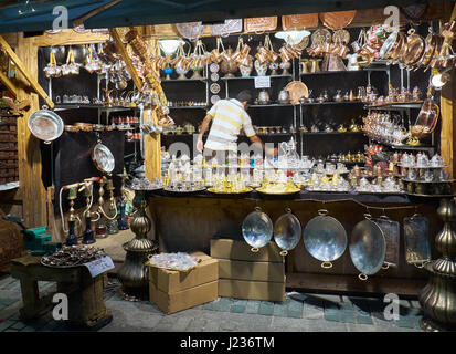 ISTANBUL, TURKEY - JULY 16, 2014: The Copper shop with traditiona Turkish handicrafts in the Ramadan Bazaar. Istanbul. Turkey Stock Photo