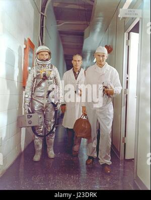 NASA Mercury-Atlas 6 Friendship 7 mission astronaut John Glenn (left), flight surgeon William Douglas, and equipment specialist Joseph Schmidt head to the launch pad at the Cape Canaveral Air Force Station February 20, 1962 in Cape Canaveral, Florida.    (photo by NASA  via Planetpix) Stock Photo