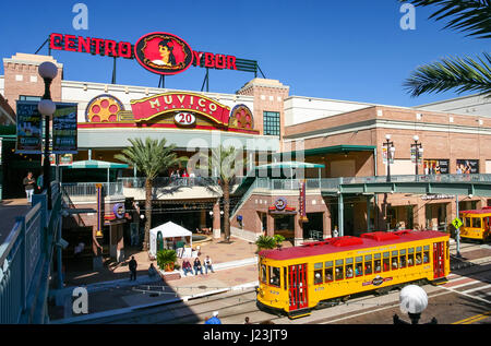TAMPA, FLORIDA, US - November 29, 2003: Centro Ybor entrance with yellow trams and visiting tourists, Tampa, FL Stock Photo