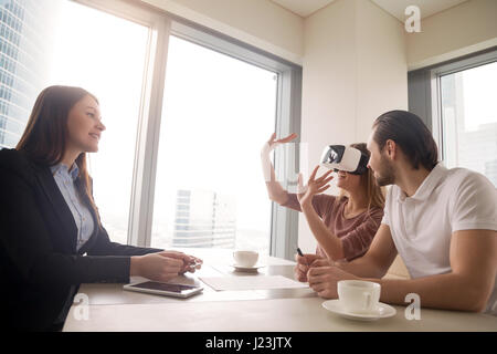 Using virtual reality glasses, VR headset for real estate tours  Stock Photo