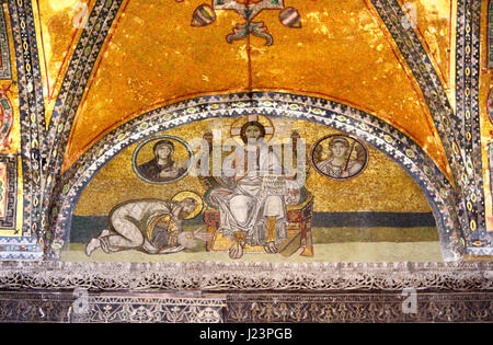 ISTANBUL, TURKEY - MARCH 30, 2013: Ancient mosaic in Hagia Sophia. Hagia Sophia is the greatest monument of Byzantine Culture Stock Photo