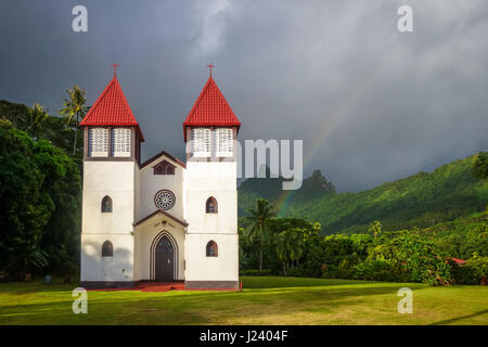 Rainbow on Haapiti church in Moorea island, landscape. French Polynesia Stock Photo