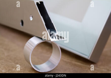 Bent metal profile channel. Furniture fittings. Stock Photo