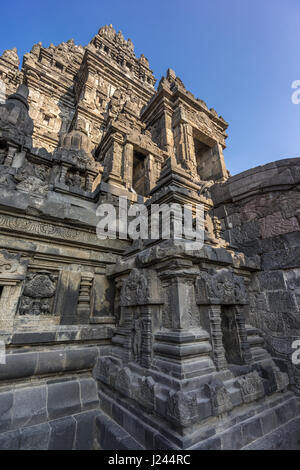 Wide Angle corner view of Candi Siwa Temple in Prambanan complex. 9th century Hindu temple compound located near Yogyakarta on Central Java, Indonesia Stock Photo