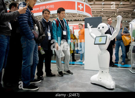 Hanover, Germany. 24th Apr, 2017. Robot 'Pepper' of the company Entrance dances at the Hanover Fair 2017 in Hanover, Germany, 24 April 2017. The world's biggest industry trade fair will see some 6500 exhibitors from the 24th to the 28th of April. The partner nation of this year is Poland. Photo: Julian Stratenschulte/dpa/Alamy Live News Stock Photo
