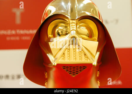 Tokyo, Japan. 25th Apr, 2017. A pure gold Darth Vader mask on display at the Ginza Tanaka jewelry store on April 25, 2017, Tokyo, Japan. To the celebrate the 40th anniversary of the series of Star Wars, the Japanese jewelry store is selling a life-size mask of Darth Vader made from 15kg of pure 24k gold. The Mask is valued at approximately 1.4 million US Dollars. The store is also selling sets of 24k gold commemorative coins with prices ranging from USD 1,201 to 11,124. The products will go on sale on Star Wars Day, May 4th. Credit: Aflo Co. Ltd./Alamy Live News Stock Photo