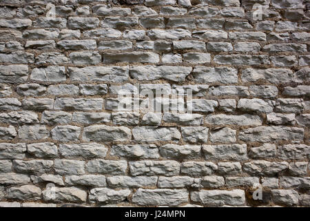a white brick wall background with sandy cement and texture Stock Photo