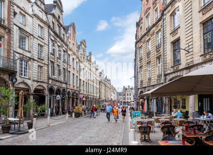 Cafe and shops on Rue de la Taillerie in the old town centre, Arras, Pas de Calais, France Stock Photo