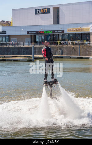 Flying on water jets. Power water jets. Stock Photo