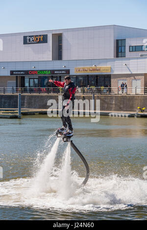 Flying on water jets. Power water jets. Stock Photo