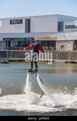 Flying on water jets. Power water jets. Stock Photo